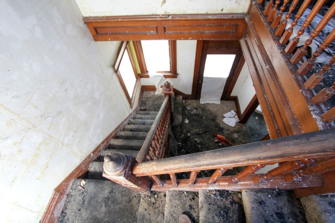 interior staircase showing fire damage